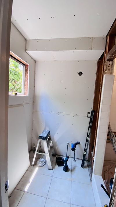 Drywall installation in progress