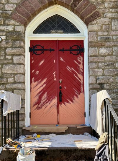 Door in mid-restoration showing sanded surface and epoxy repairs — Pennsylvania