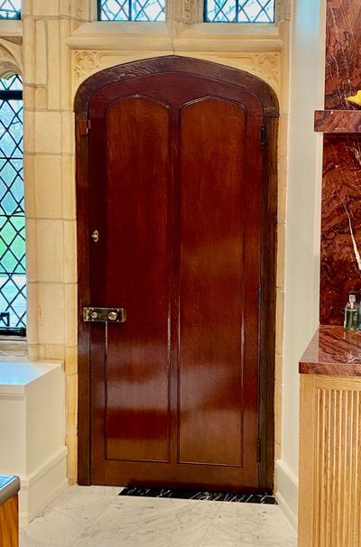Historic Gothic door restoration completed — installed in Wyndmoor Gothic Revival stone home